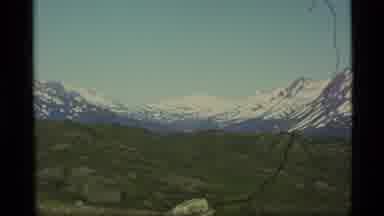 Alaska USA (1977): Panoramas Of Snow Capped Mountains Lakes And Grassland Under A