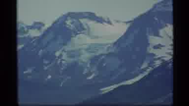 Alaska USA (1977): Panning Across An Icy Winter Landscape In Tall Cold Mountains
