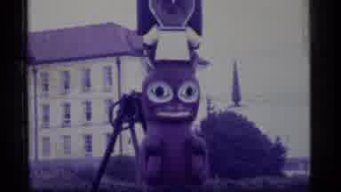 Alaska USA (1977): View Of Totem Pole With Wide Eyed Brown Figure On It In Front