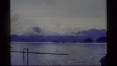 Alaska USA (1977): Fish Jumping On A Lake Surface