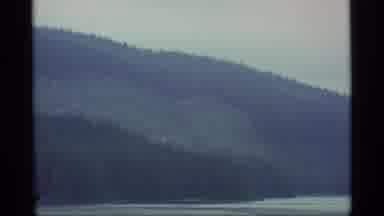 Alaska USA (1977): Remote Coast Line At The Edge Of Pine Forest With Islands
