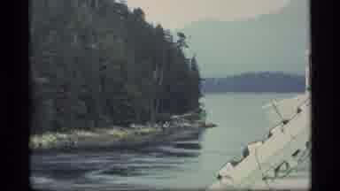 Alaska USA (1977): View From Ship With People On Board Of Trees Across Narrow