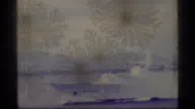 Alaska USA (1977): Ship Sailing In Coastal Waters Near Forested Land But Film