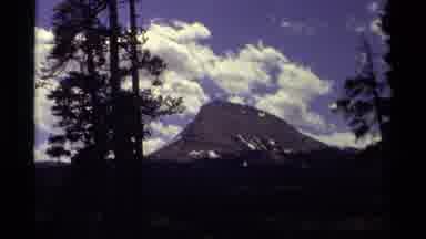 Canada (1979): View Of Black Mountain Against Blue Sky On A Sunny Day