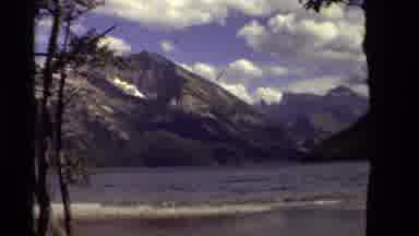 Canada (1979): Camera On A Beach Zooms Into Distant Mountains In The Background