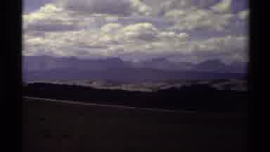 Canada (1979): Clouds In The Sky Over The Mountain Tops With The Street View