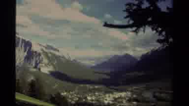 Canada (1979): This Is Two Photos Of Two Snowy Top Mountain Sides Leading To A