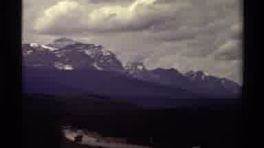 Canada (1979): A View Of The Large Mountain Peaks During Twilight Hours