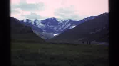 Alaska USA (1977): A Group Of Hikers Walking In A Dangerous Area With High