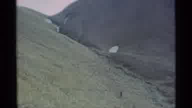 Alaska USA (1977): Dark Rock Slightly Tan Rock Slight Rocks Uphill Boulders