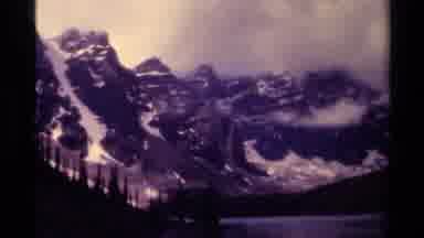 Canada (1979): A Video Of A Rocky Mountain With Snow On It