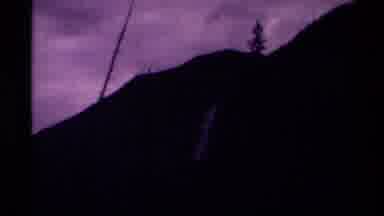 Canada (1979): A Waterfall Quickly Spouting Out Of A Snowy Mountain Side