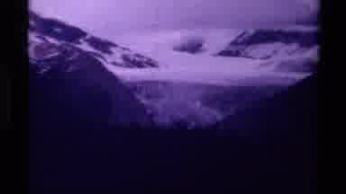 Canada (1979): Snow And Clouds In The Mountains With Treeline And Sign Reading