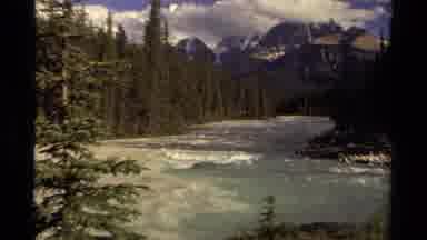 Canada (1979): Rolling Waters In The Forest With Mountains In The Background