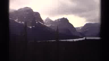Canada (1979): Gloomy And Cloudy Mountain Landscape In The Green Forest By A Water