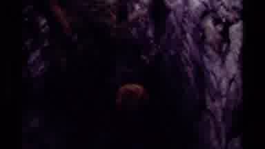 Canada (1979): A Person Walking In A Cave