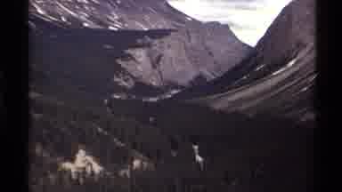 Canada (1979): Classic Footage Of A Forest Valley In Between Two Rocky Mountains
