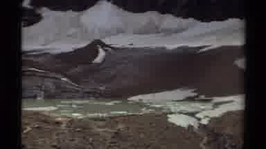 Canada (1979): View Of Melting Mountain Snow And Lakes On A Cloudy Day