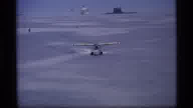 Alaska USA-1977: Seaplane Zips Across The Water As It Tried To Take Off Into The