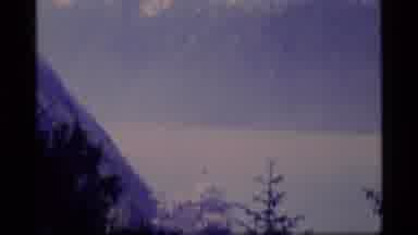 Alaska USA (1977): Winter Wonderland Trail Nestled Among Trees And Mountain Ranges