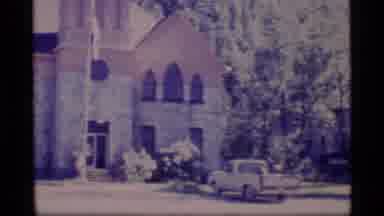 Alaska USA (1977): A Group Of Workers Working Outside Of A Big Mansion House