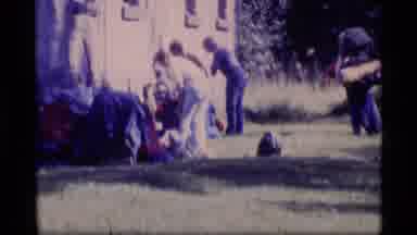 Alaska USA (1977): A Group Of Construction Workers Working Outside Of A Building