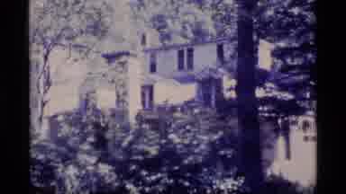 Alaska USA (1977): Large House With Trees Then Camera Is Covered Up And Then The