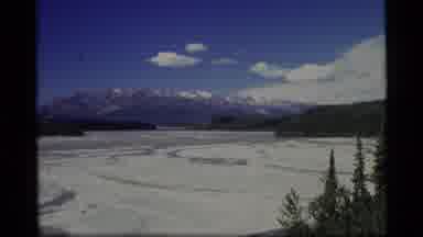 Alaska USA (1977): Winter Snow Covering A Lake In The Mountains But The Ski Lift