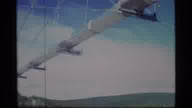 Alaska USA (1977): Panning Over An Airplane Being Built Near Beautiful Forest