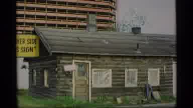 Alaska USA (1977): Old Log Cabin Stuck In Modern World