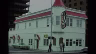 Alaska USA (1977): View Of The Red And White Club 25 Building And A New Building