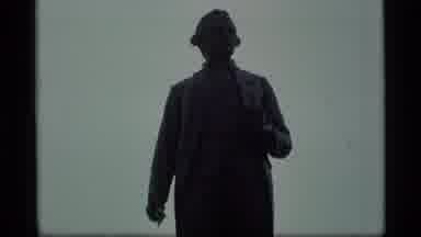 Alaska USA (1977): View Of A Statue Over A Grey Sea Landscape