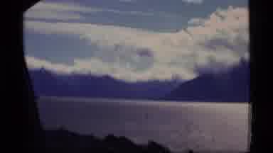Alaska USA (1977): View Of Clouds Sea And Cliffs From A Boat Sailing