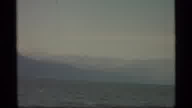 Alaska USA (1977): A View Of The Ocean And Big Mountain Tops
