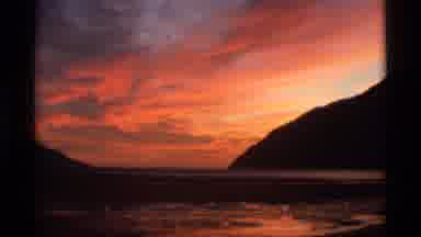 Alaska USA (1977): Busy Airport Terminal Red Sunset Behind A Coastal Mountain