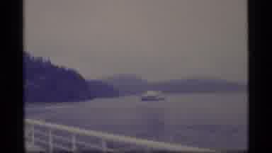 Alaska USA (1977): A Ferry Boat In A Large Body Of Water Transporting People And