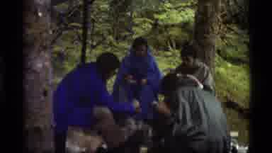 Alaska USA (1977): Shot Of People Camping Second Shot Of Large Ship In Body Of