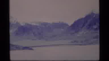 Alaska USA (1977): Blurry Image Of Mountains And A Frozen Lake With A Distant Sky
