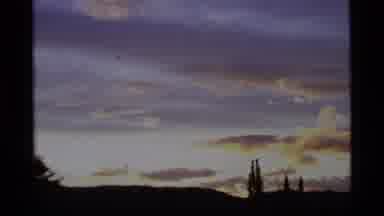 Alaska USA (1977): Zoom Out From Objects On The Skyline At Sunset With Sharp Cut