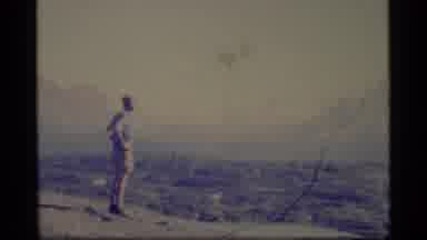 Alaska USA (1977): Man Contemplates The Beauty And Peacefulness Of Nature