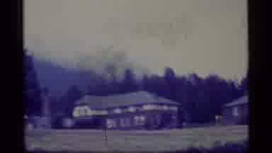 Alaska USA (1977): We Are Able To See A Residence With Homes And Trees In The