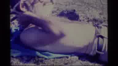 Alaska USA (1977): Bearded White Man Laying On The Ground In The Sun Beside A