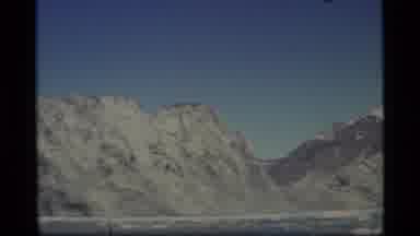 Alaska USA (1977): A Video Of A Rocky Mountain With Snow On It