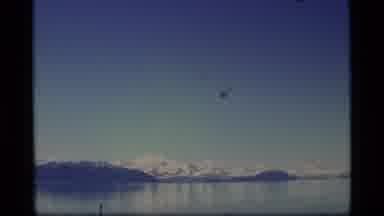Alaska USA (1977): Person In A Boat Moving Through A Cold River Looking At