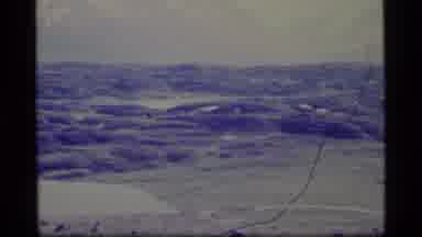 Alaska USA (1977): Vintage Colored Aerial Video Footage Of A Wooded Valley Area