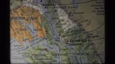 Glacier Bay Alaska USA (1977): A View Of Someone Looking At A Region Map