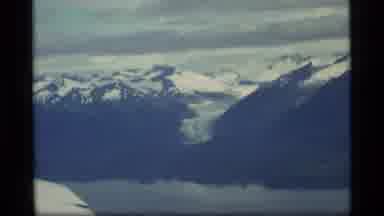 Glacier Bay Alaska USA (1977): Overhead View Of Snowy Mountains And Dark Colors