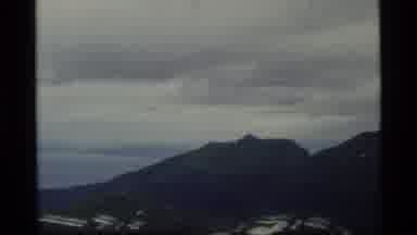 Glacier Bay Alaska USA (1977): A Plane That Is Flying Over Mountain Green Grass