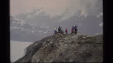 Glacier Bay Alaska USA (1977): A Group Of People Stand On A Mountain Peak And