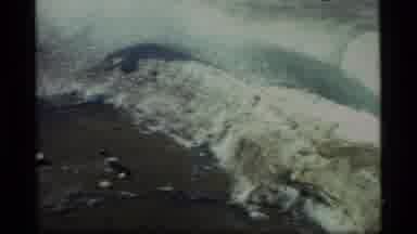 Glacier Bay Alaska USA (1977): Snow Or Icebergs Melting Near River Bank With Rocks